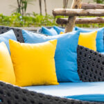 Outdoor patio in the garden with sofa chair and pillow decoration for take a relax